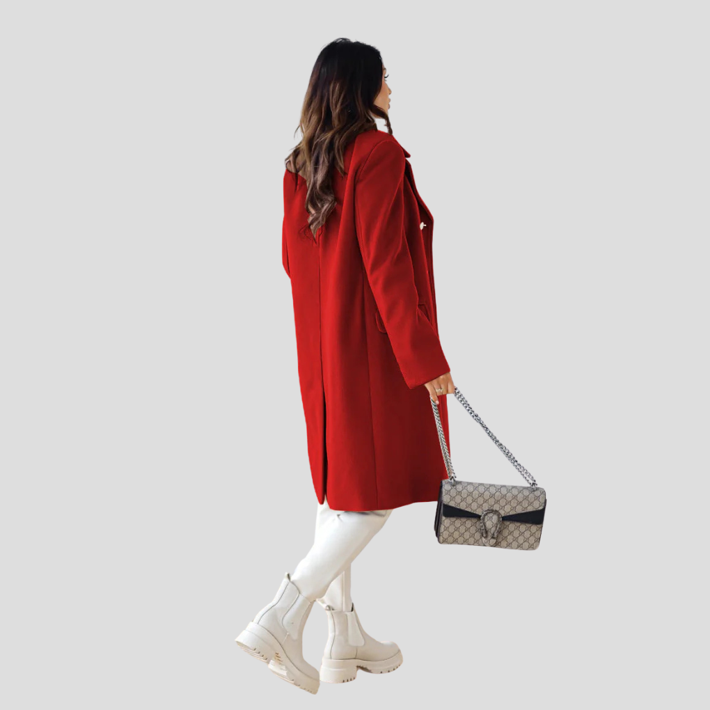 Tailored women's double-breasted coat. Sophisticated fall jacket for a chic office look.
