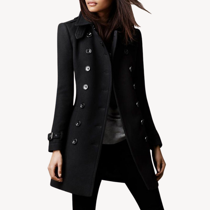 Stylish women's mid-length peacoat with double-breasted design. Perfect chic fall/winter jacket.