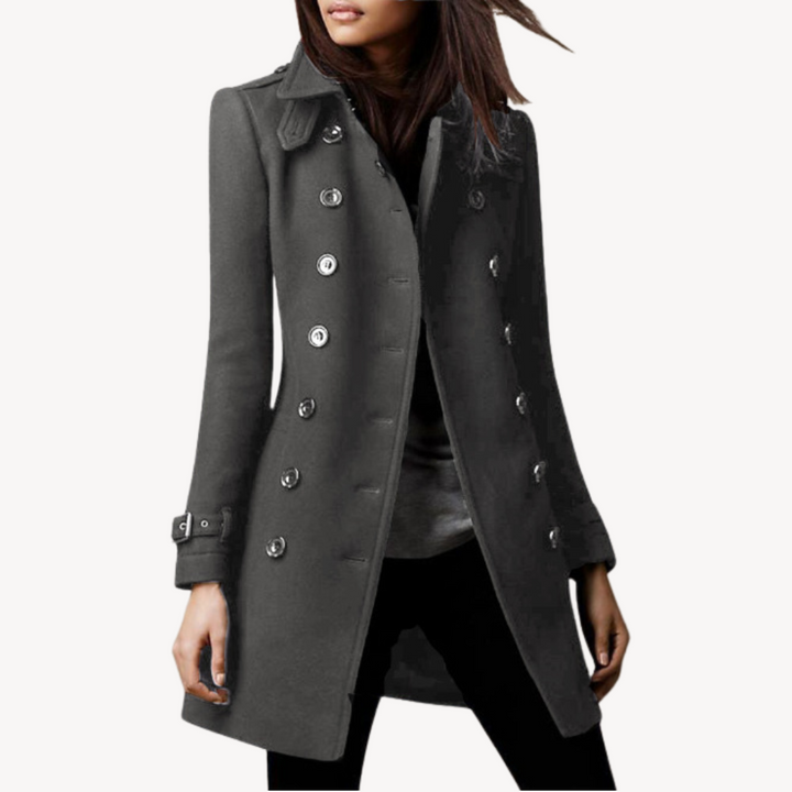 Chic women's mid-length peacoat. Double-breasted design, elegant and perfect as a fall or winter jacket.