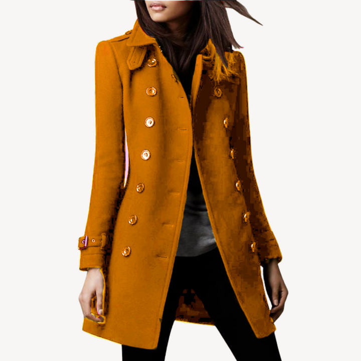 Versatile women's double-breasted mid-length peacoat. A classic tailored jacket for fall and winter style.