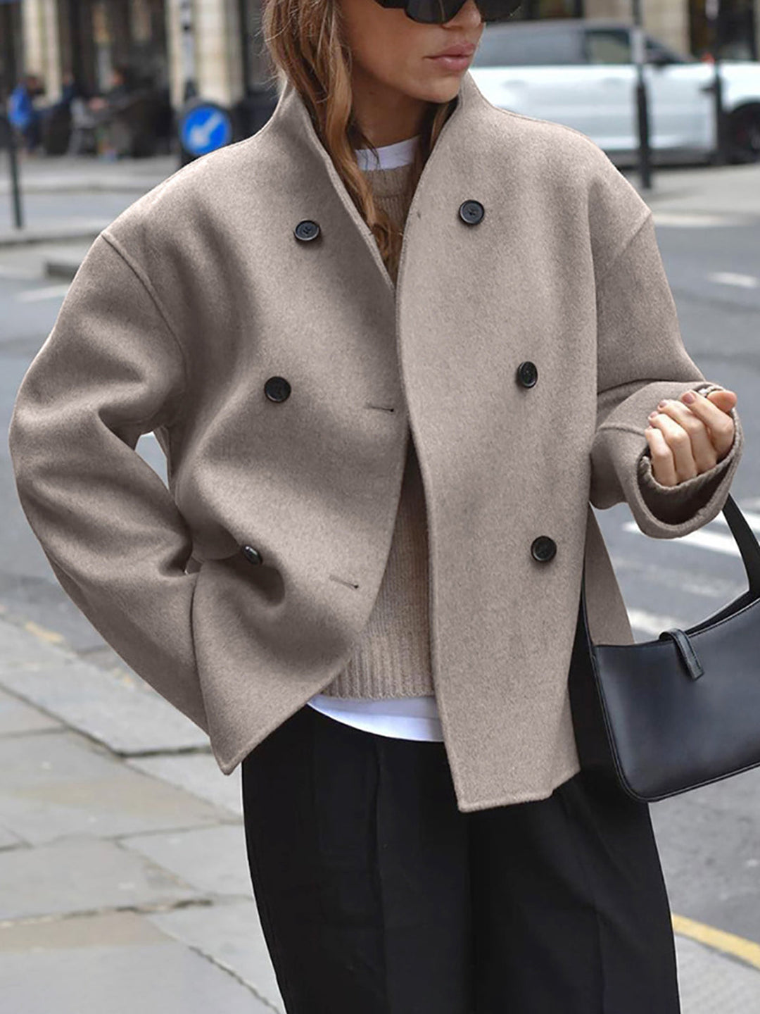 Women's classic double breasted pea coat, ideal for winter warmth & style.