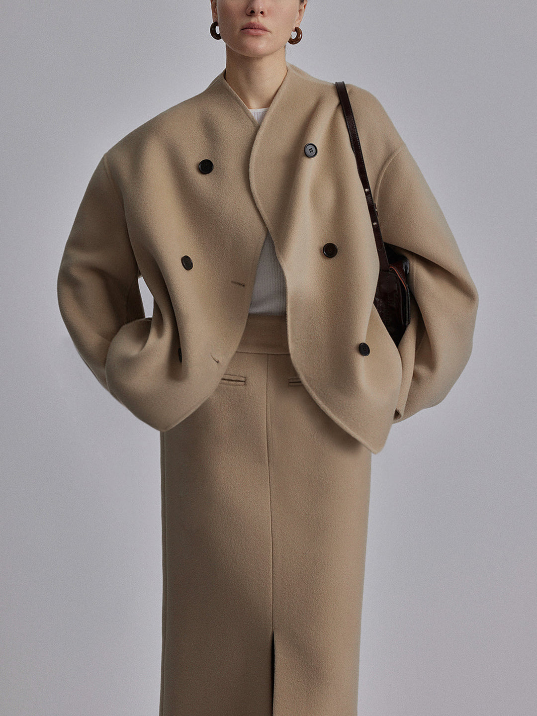 Stay warm in this women's double breasted pea coat, combining classic style with winter protection.