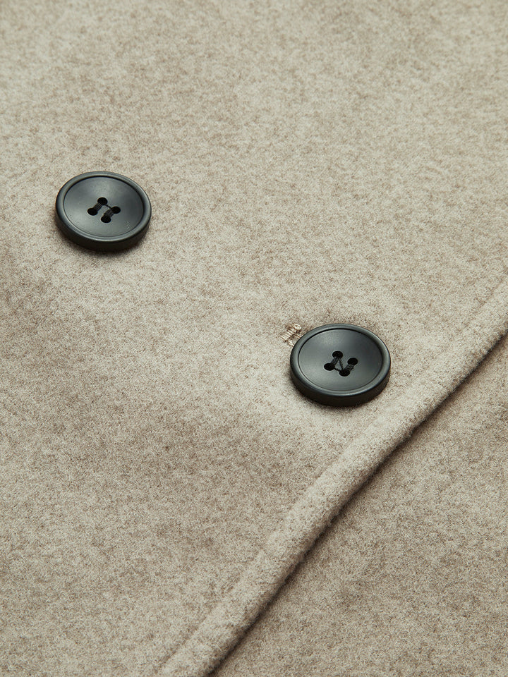 Navy women's double breasted pea coat, classic warm winter outerwear with a stand collar.