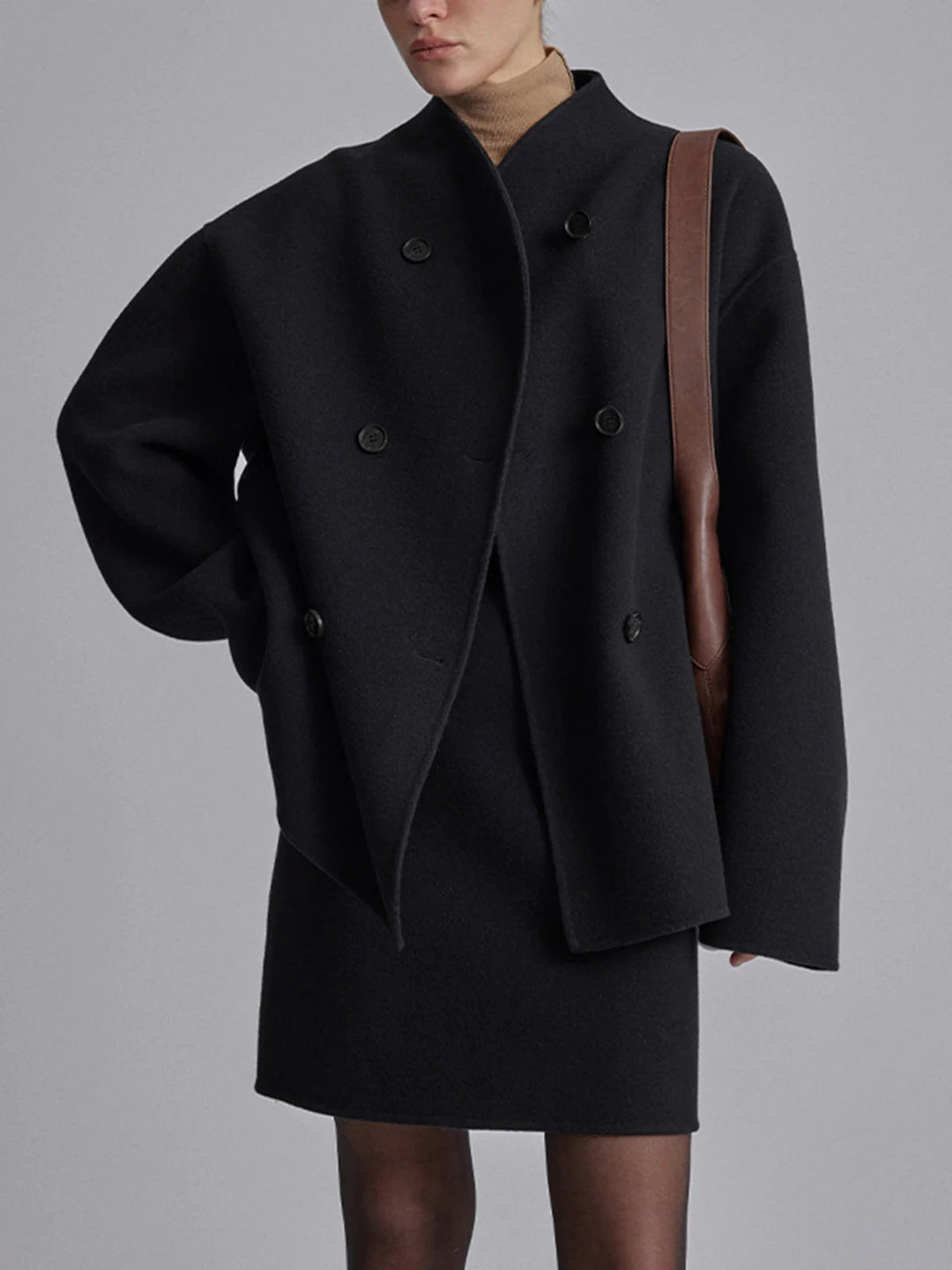 Timeless classic women's double breasted pea coat, essential warm outerwear for winter.