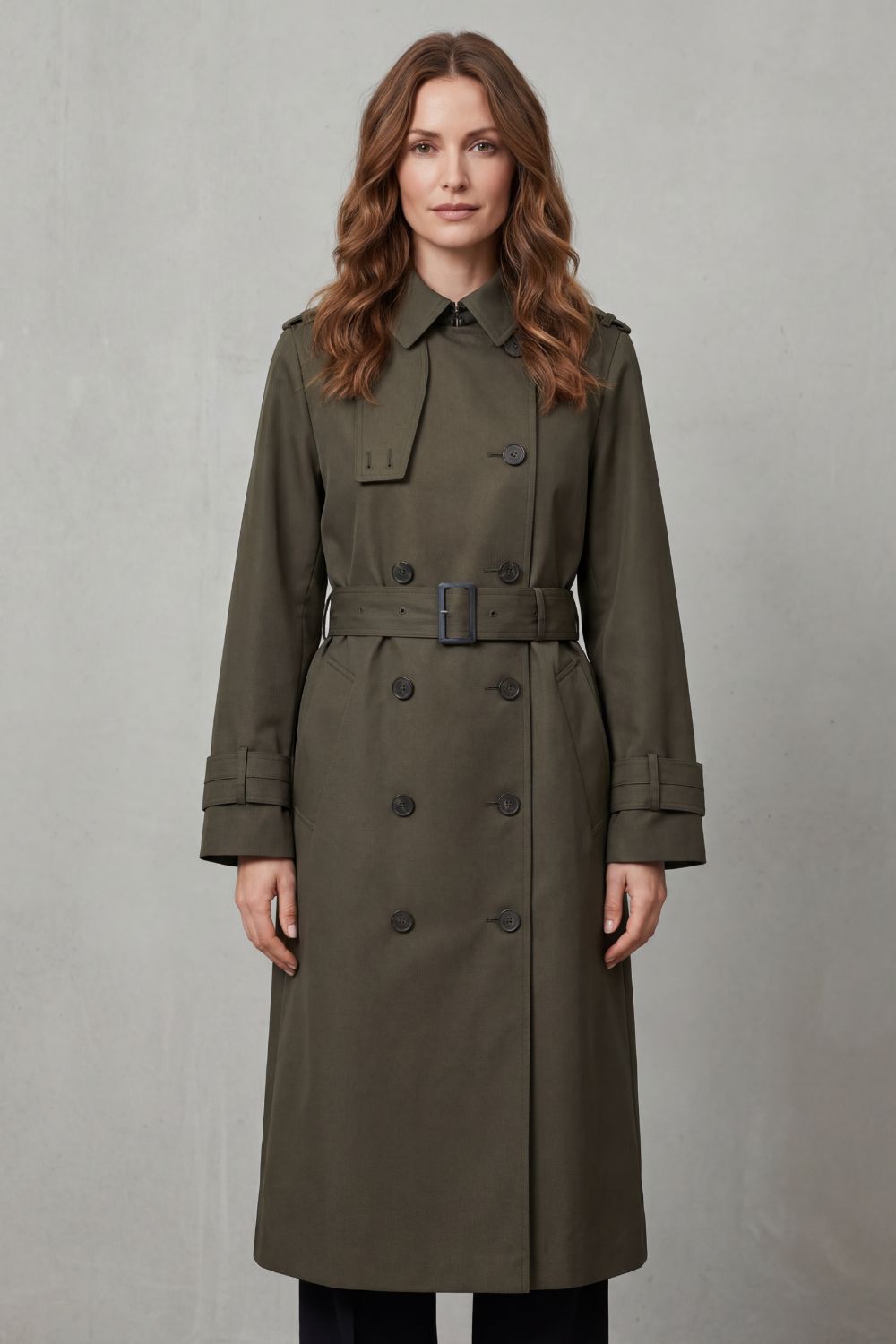 Versatile classic double-breasted trench coat, ideal for elegant fall layering & crisp spring days.