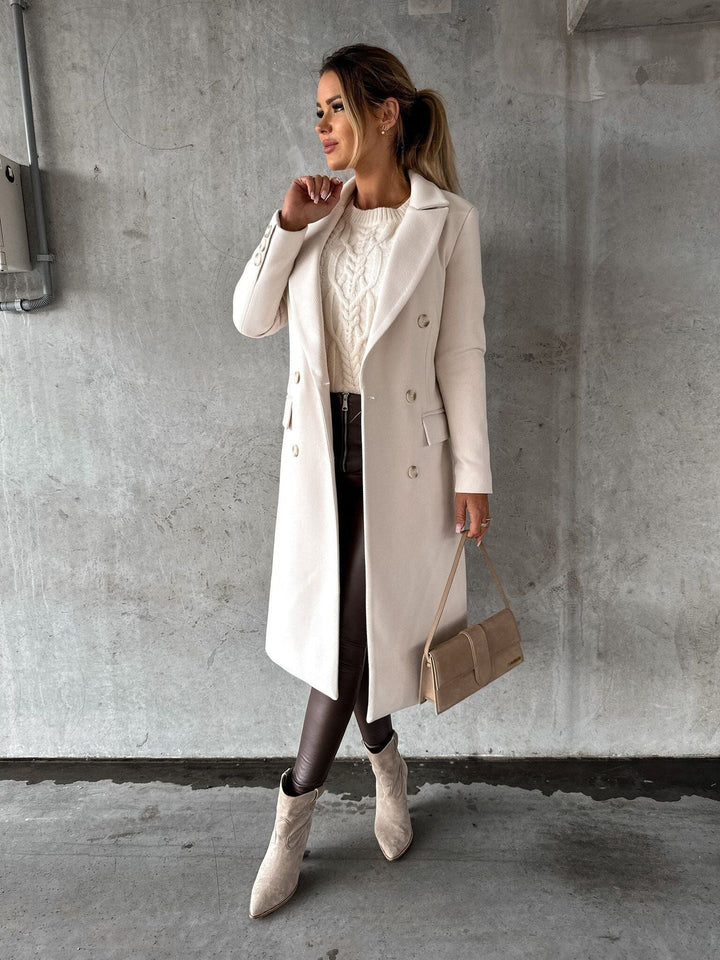 Beige women's classic double-breasted winter jacket, an elegant & warm outerwear choice for chic fashion.
