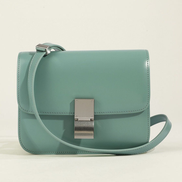Vintage charm women's classic flap box shoulder bag. Timeless and chic fashion accessory.