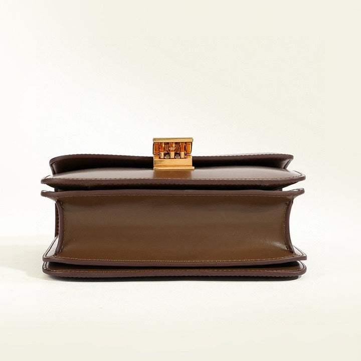 Lightweight women's flap shoulder bag with a classic box design. Elegant and versatile.