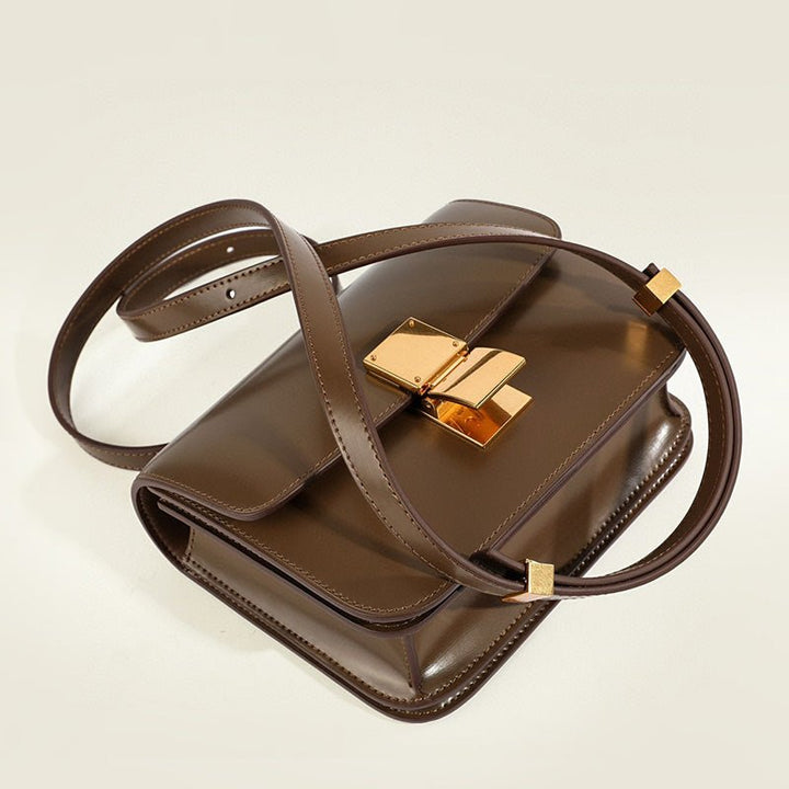 Compact women's flap shoulder bag, classic style. A timeless, chic fashion accessory.