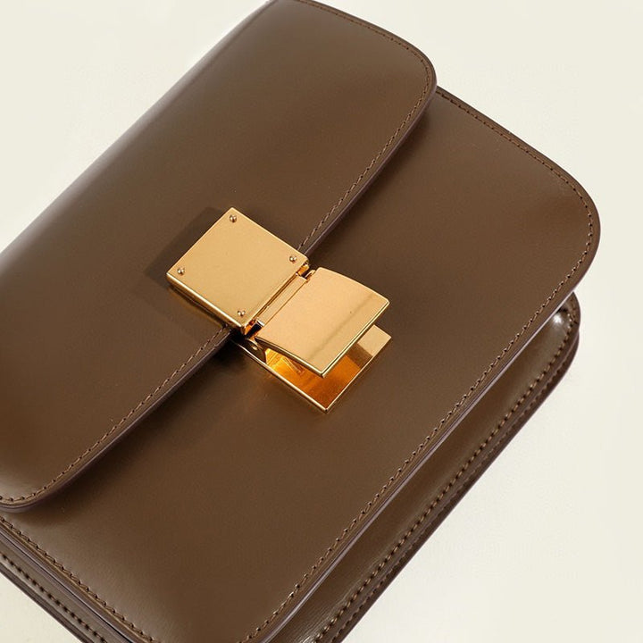 Versatile women's flap box bag. Elegant classic shoulder handbag for daily use with vintage charm.