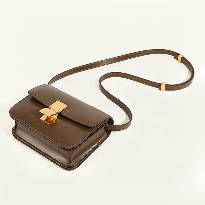 Women's classic style flap box shoulder bag. Timeless elegance and everyday functionality.