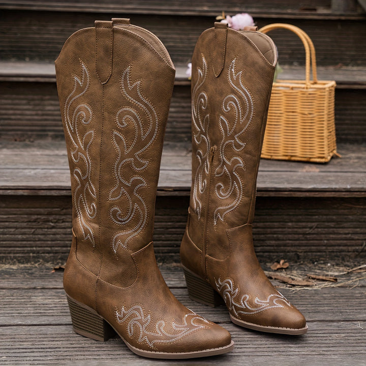 Quality construction of women's knee-high cowboy boots, with block heel & classic western style.