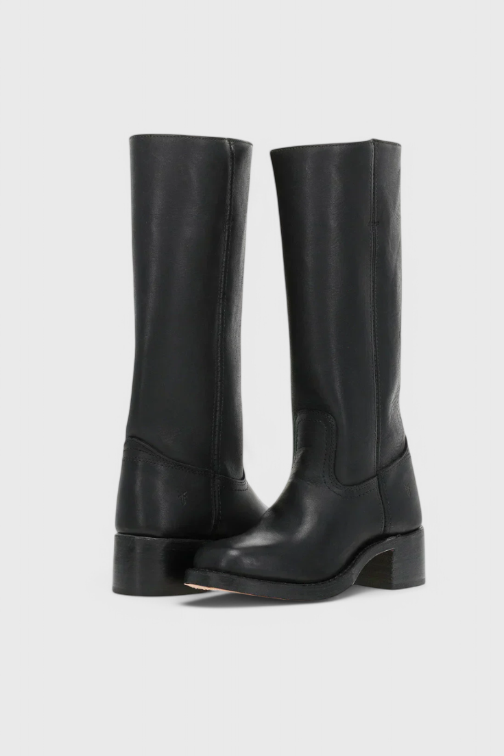 Fashionable women's tall heeled boots. Great for winter outfits, versatile, and stylish footwear.
