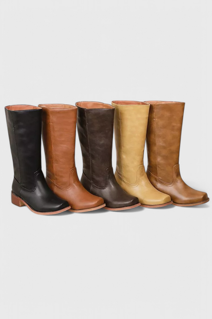 Front view: Women's classic knee-high heeled boots, showcasing elegant design and comfortable heel.