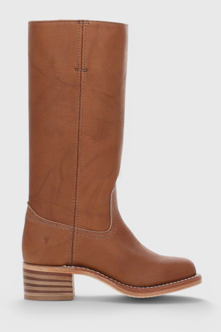 Versatile women's knee-high heeled boots. Pair with skirts or dresses for a chic winter look.
