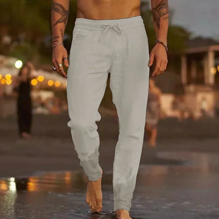 Elegant women's lace pants featuring a relaxed fit & elastic waist, ideal for summer comfort.