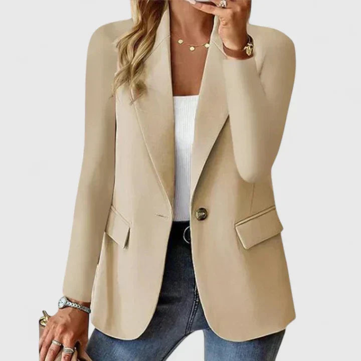 Tailored women's blazer, single button, classic lapel. Elegant professional jacket for office fashion.
