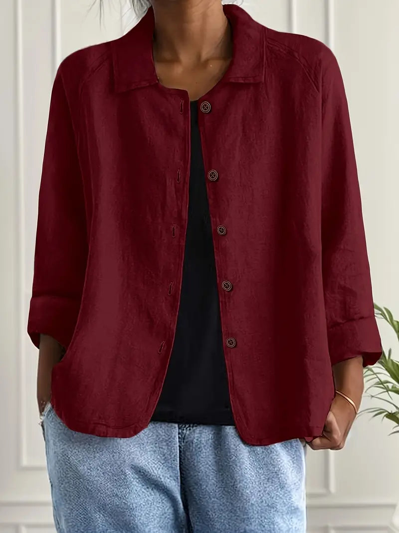 Classic black women's long sleeve top, ideal for layering. Lightweight & comfortable for everyday style.