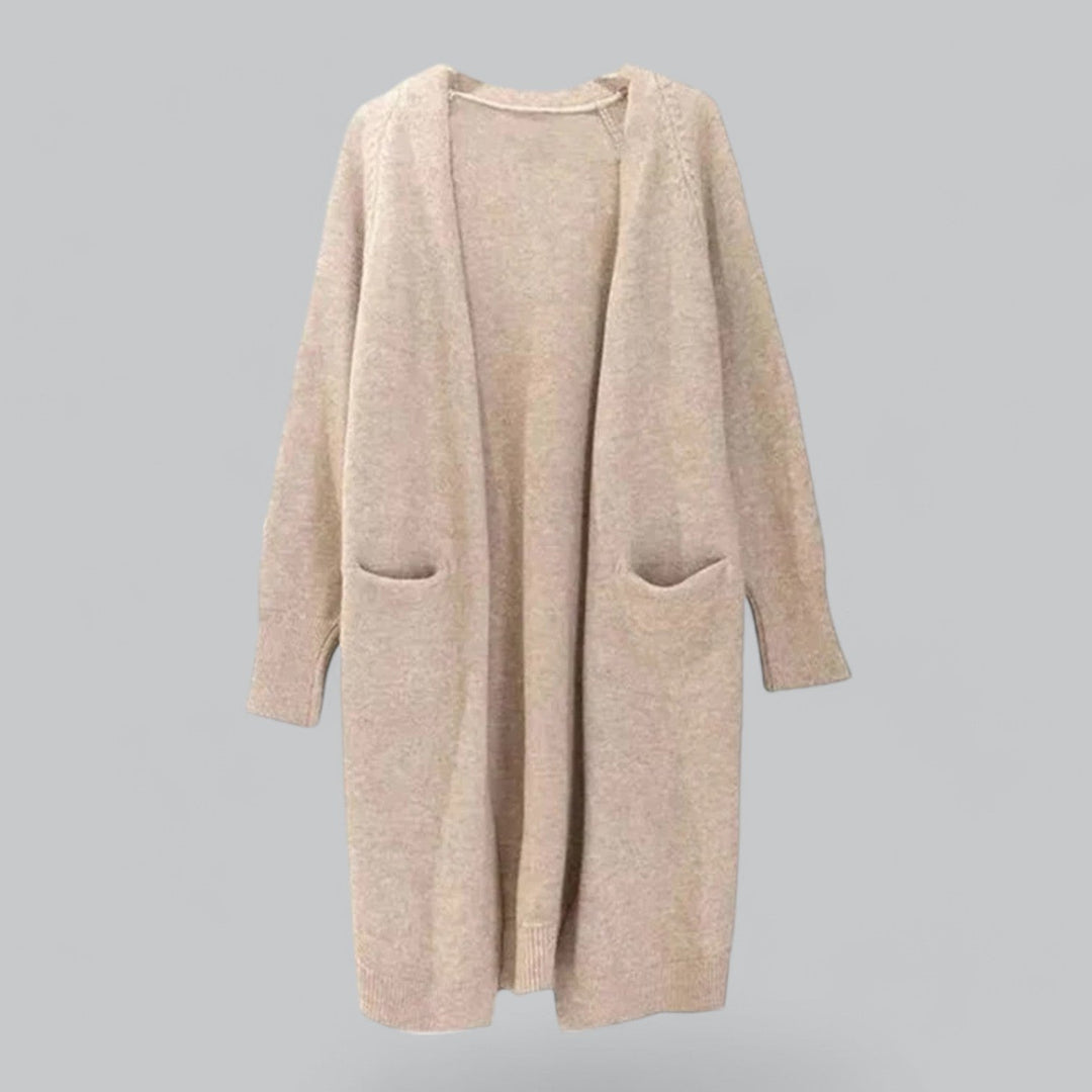 Graceful long-line women's cardigan, an elegant classic knit for comfort & versatile style. Ideal for layering.