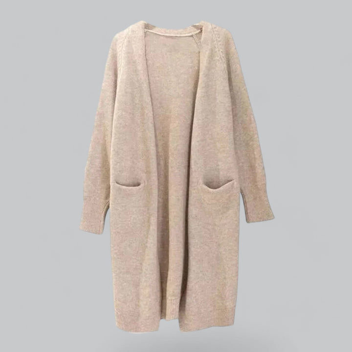 Graceful long-line women's cardigan, an elegant classic knit for comfort & versatile style. Ideal for layering.
