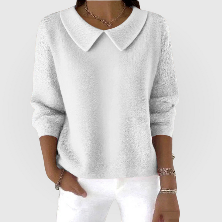 Relaxed fit green women's classic top. A comfortable long sleeve jumper for versatile apparel and casual styling.