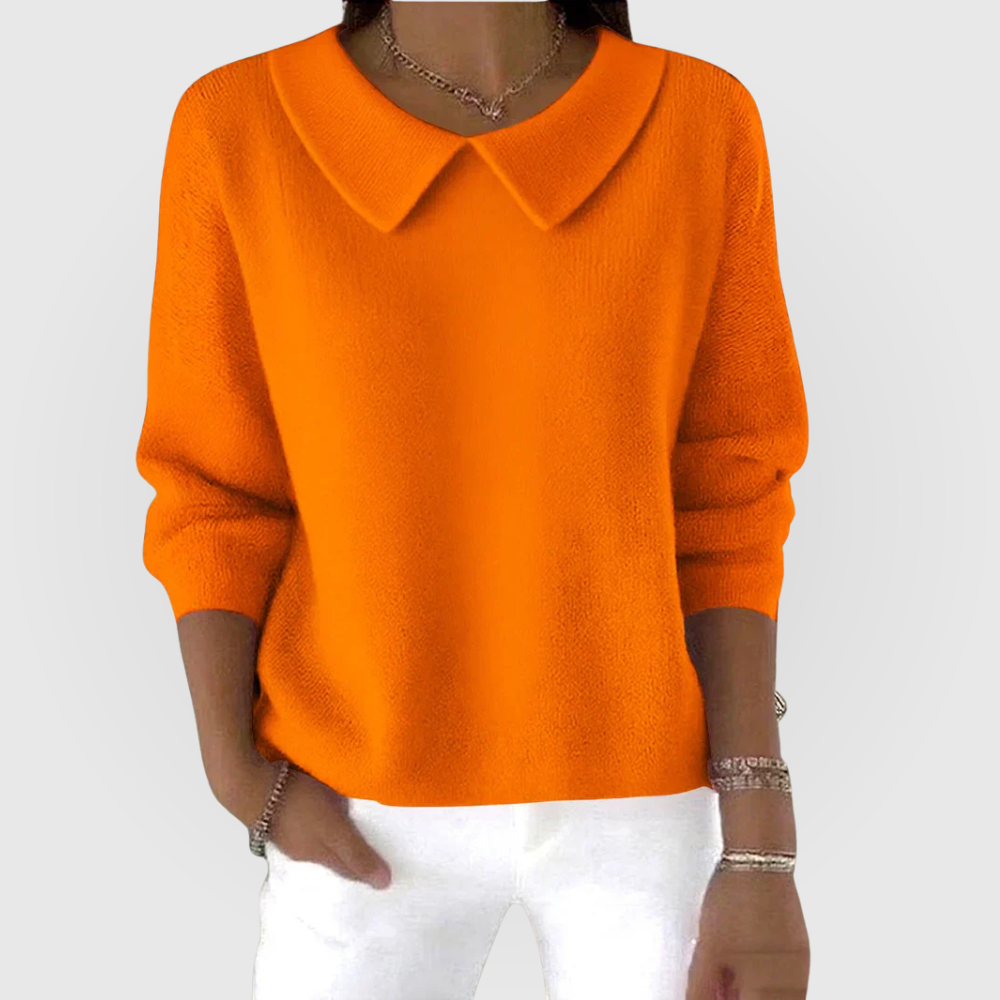 Vibrant orange women's sweater, a stylish classic top with a relaxed fit. Ideal for comfortable casual fashion.
