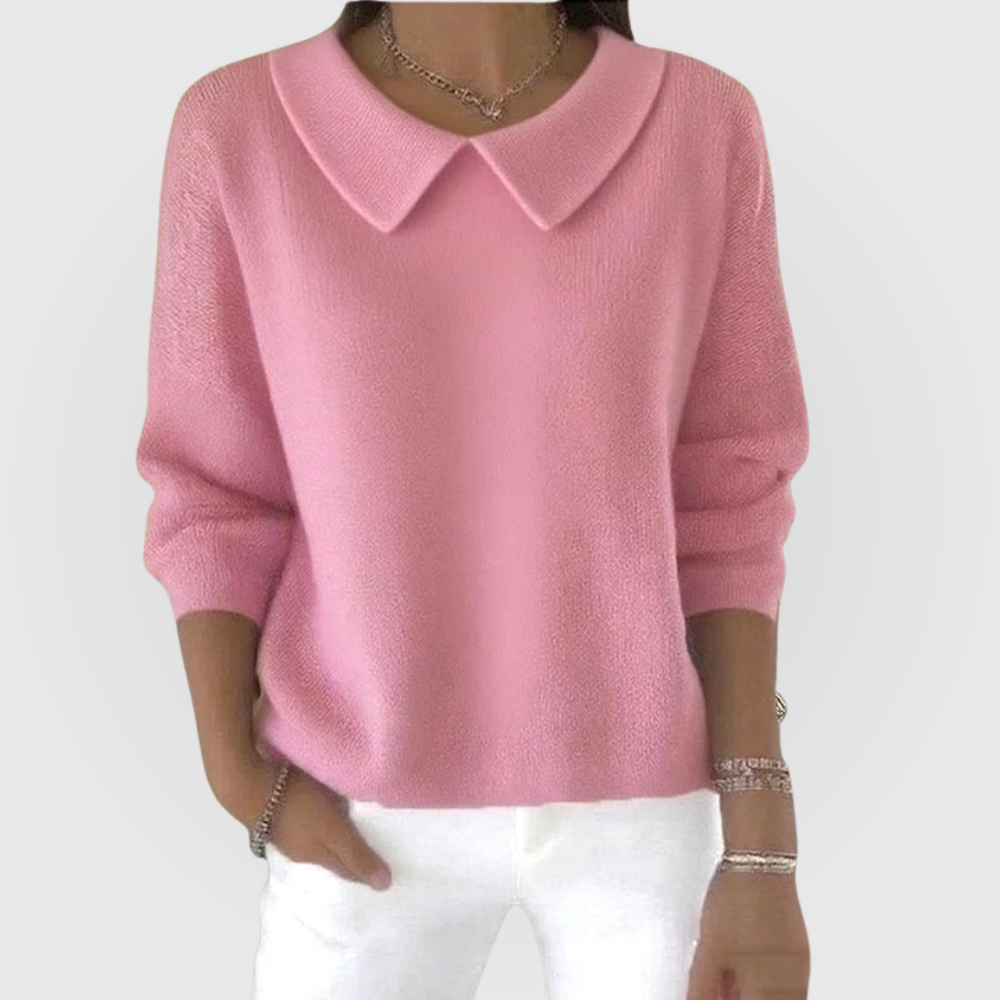 Elegant white women's long sleeve jumper, a classic top offering effortless comfort and versatile everyday style.