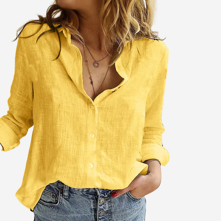 Essential summer style: a women's relaxed fit long sleeve linen blend shirt.