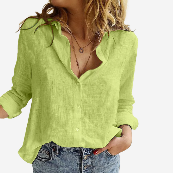 Chic linen blend blouse with classic button-down design for women.