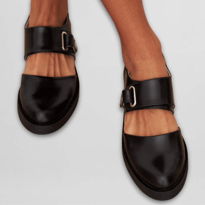 Elegant smart casual footwear for women featuring a comfortable low heel and buckle strap.