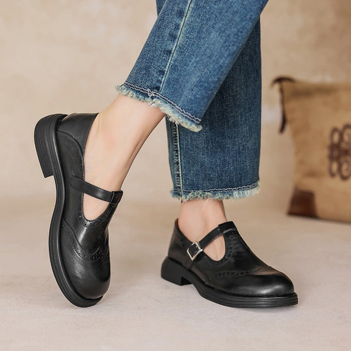 Women's classic Mary Jane dress shoes with buckle strap, closed toe. Elegant & comfortable for events.