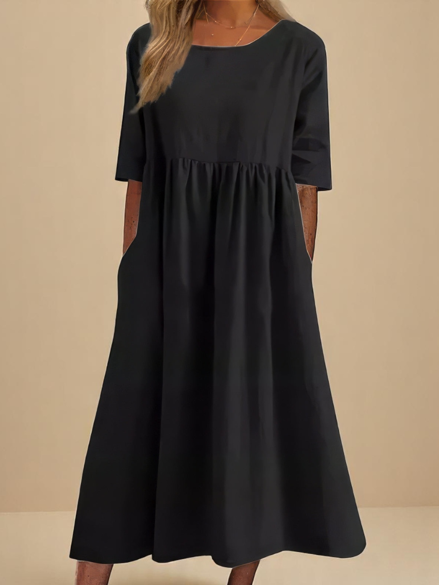Lightweight summer dress for women, mid-sleeve, offering everyday comfort and a classic casual look.