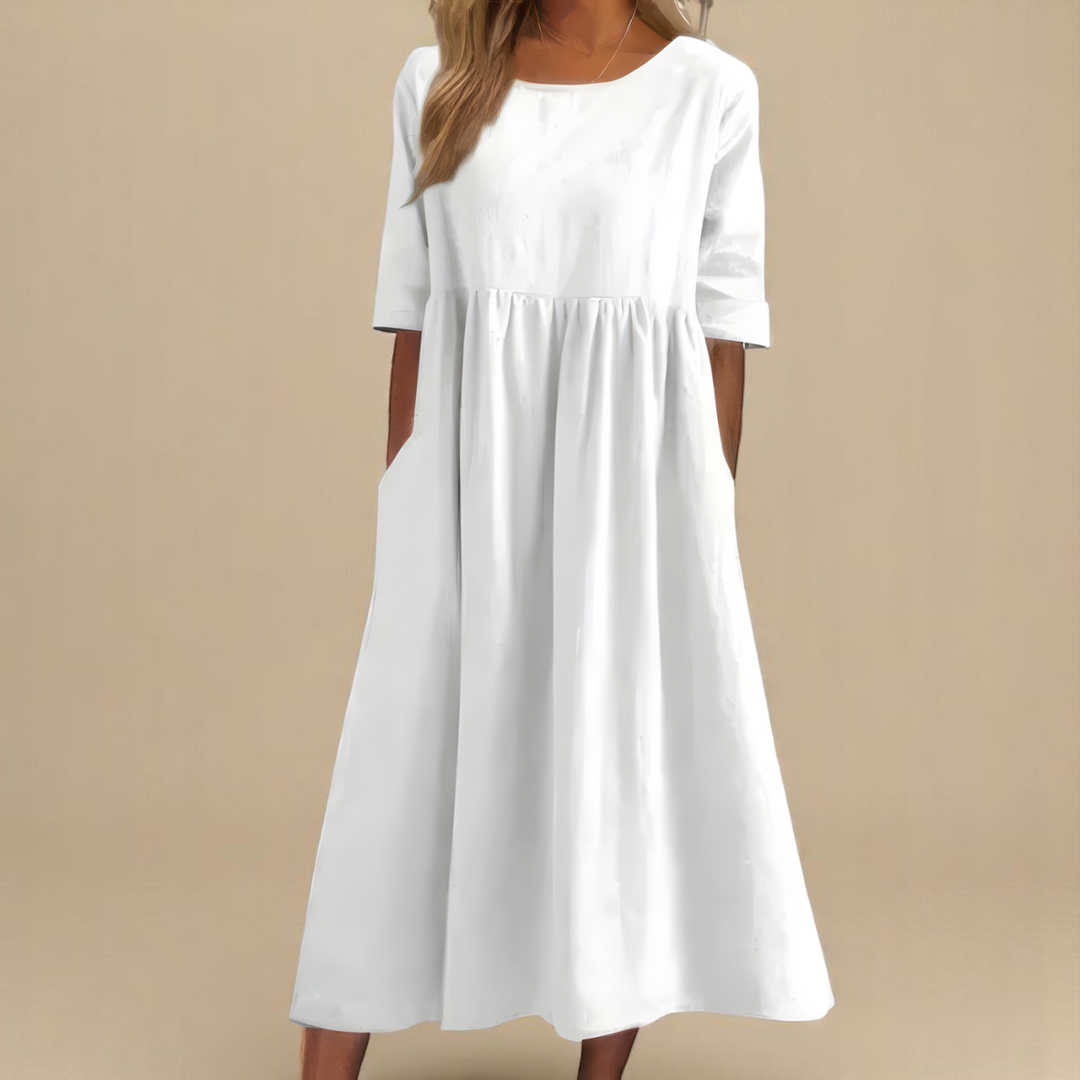 Textured detail of a comfortable, lightweight women's mid-sleeve dress, perfect for everyday summer fashion.