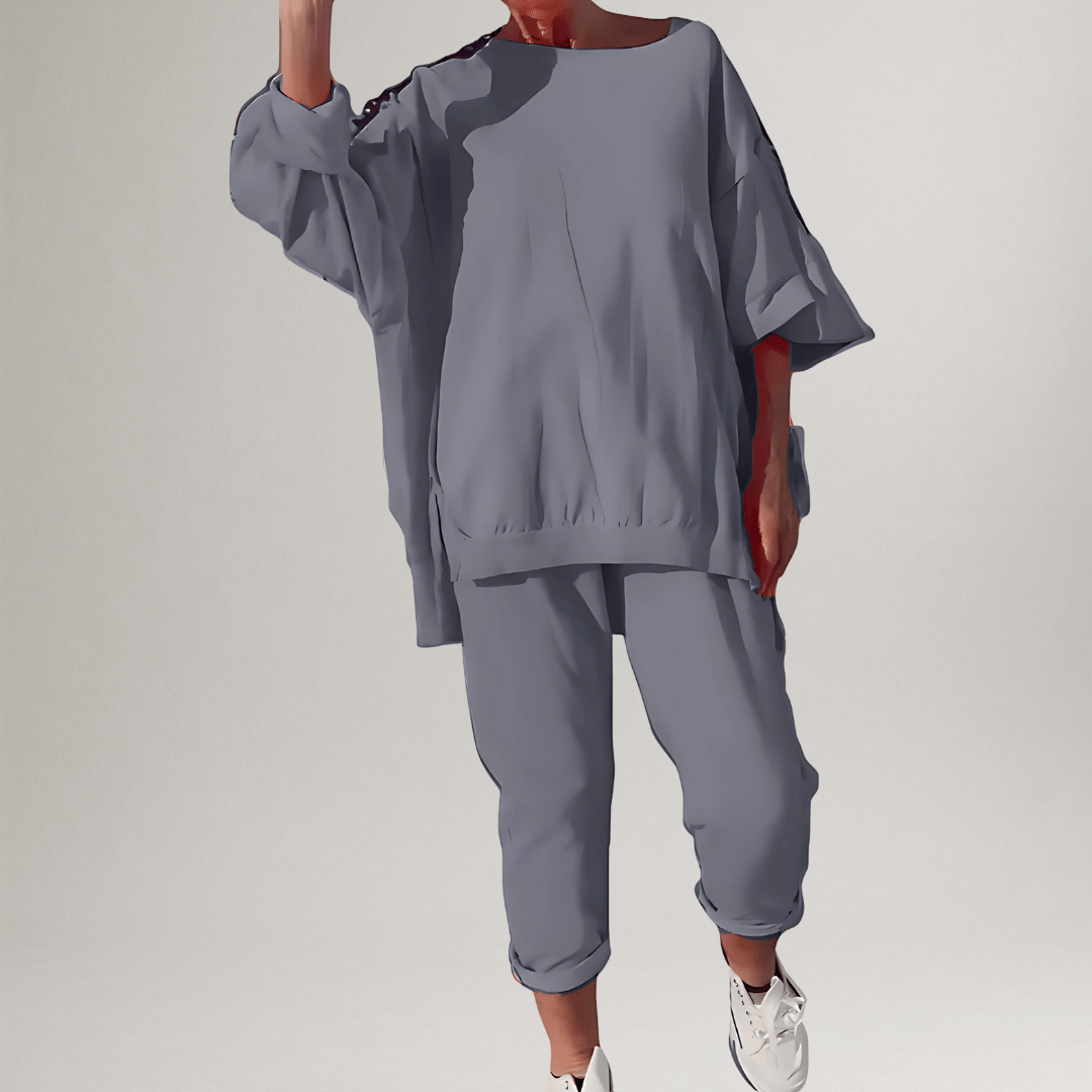 Matching women's oversized lounge set featuring a relaxed fit blouse & comfortable trousers for everyday style.