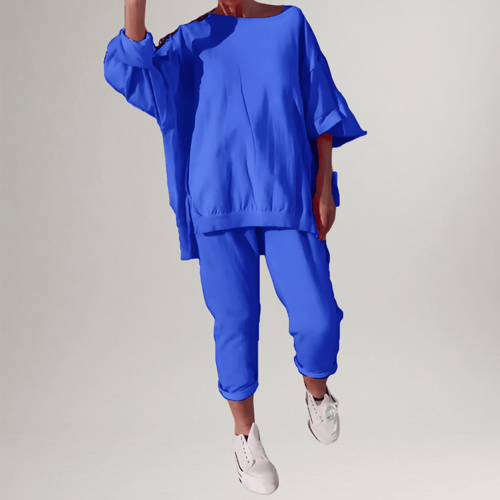 Casual women's oversized blouse and trouser set, a comfortable two-piece outfit for relaxed everyday wear.