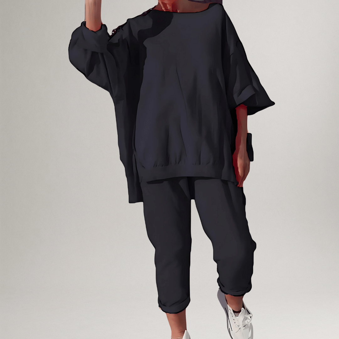 Classic women's oversized blouse and matching trousers, a stylish and comfortable two-piece lounge set.
