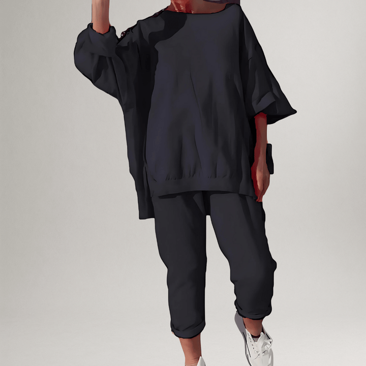 Classic women's oversized blouse and matching trousers, a stylish and comfortable two-piece lounge set.