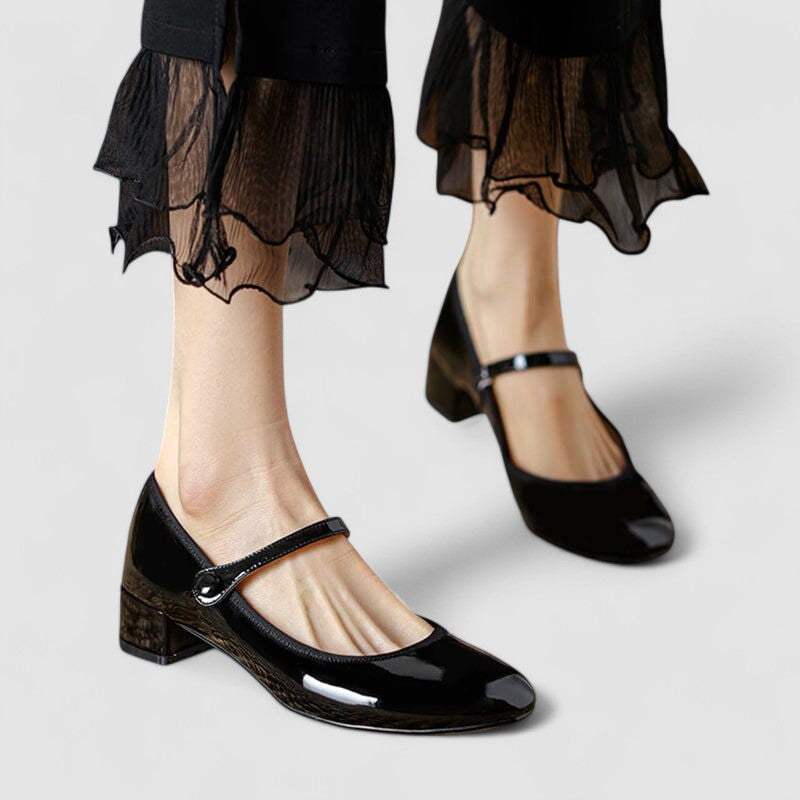 Women's classic patent Mary Jane heels with comfortable block heel & rounded toe.