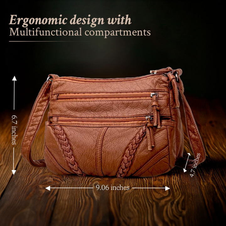 Durable women's classic leather crossbody travel bag, ideal for daily commutes & carrying essentials securely.