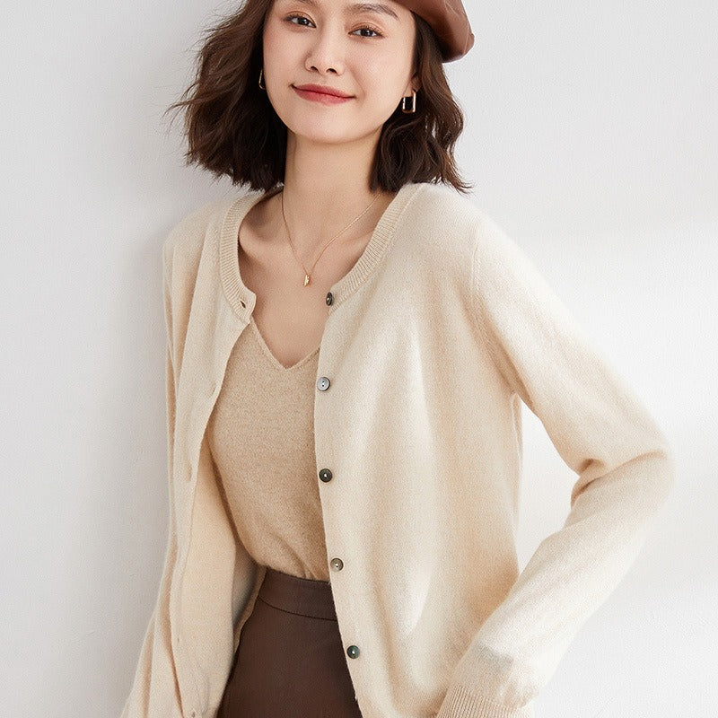 Chic women's button-front cardigan sweater, a must-have layering piece for any wardrobe.