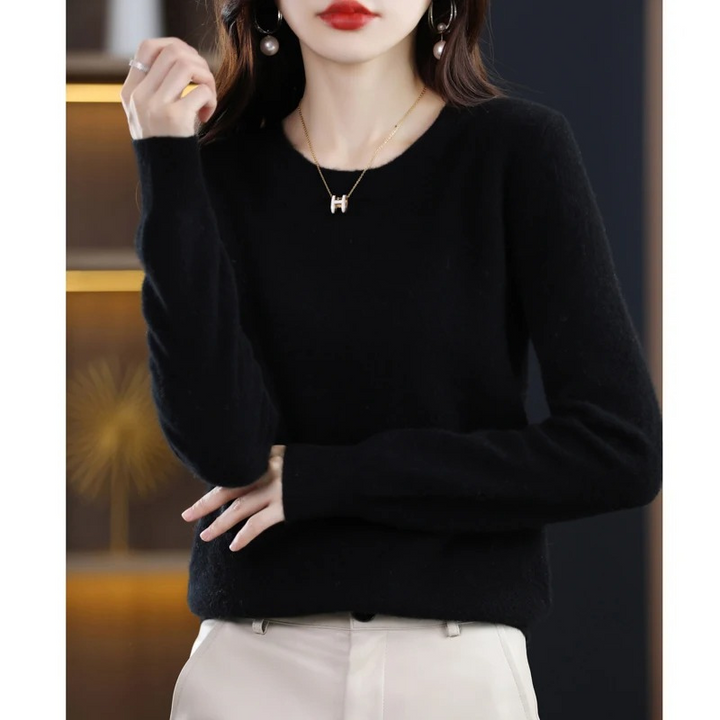 Experience ultimate comfort in this women's classic round neck sweater