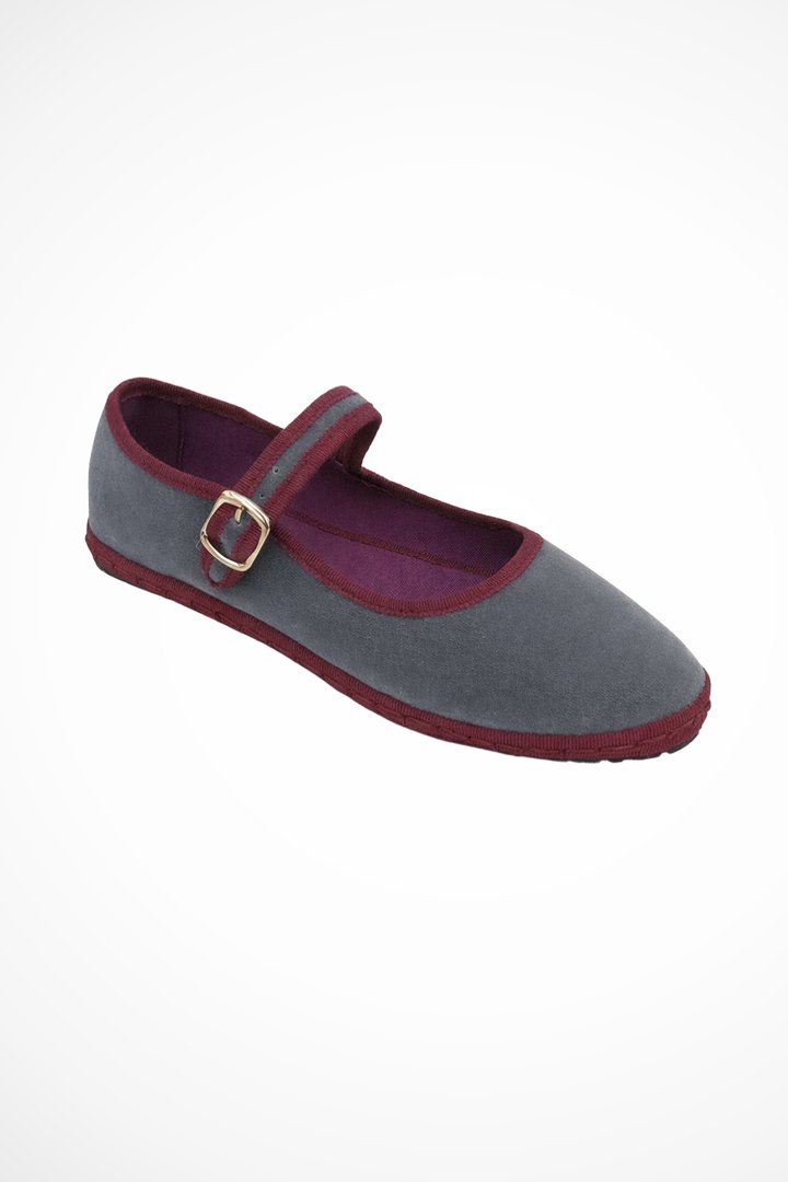 Stylish slip-on women's flats, classic black Mary Jane design with a prominent round toe and buckle strap.
