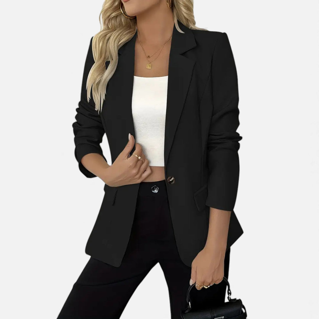 Refined women's classic blazer, offering a polished finish to professional or casual ensembles.