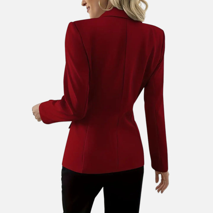 Professional women's single-breasted blazer, a wardrobe essential for sophisticated business attire.