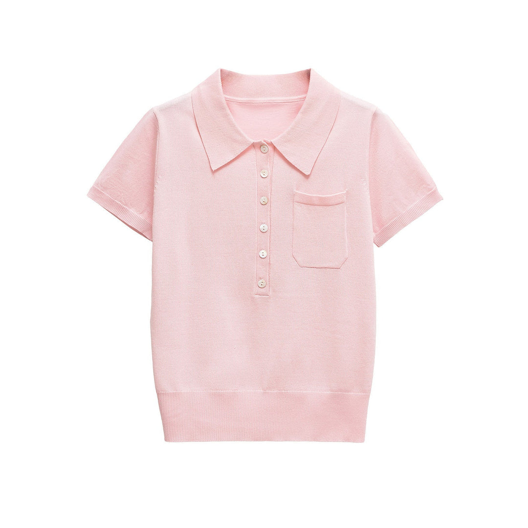 Model wearing a women's slim fit short sleeve button polo shirt, highlighting its flattering cut.