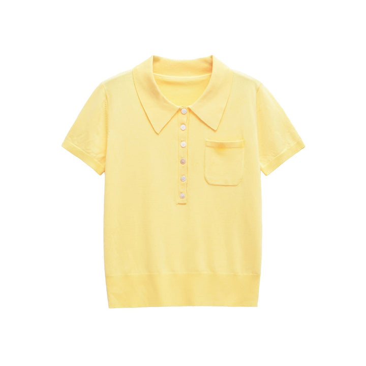 Versatile women's button polo shirt. Slim fit, short sleeve design for a timeless, casual-chic aesthetic.