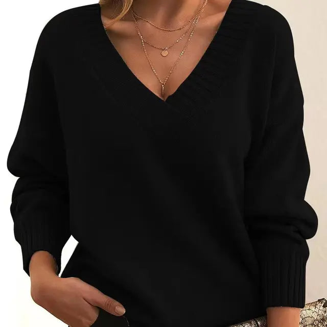 Elegant women's soft knit pullover, long sleeve, versatile for casual or winter fashion. Cozy and warm.