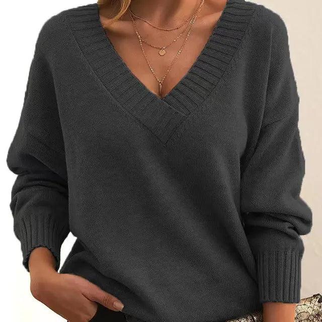 Cozy women's round neck knit pullover sweater, soft texture, ideal long sleeve top for fall fashion.