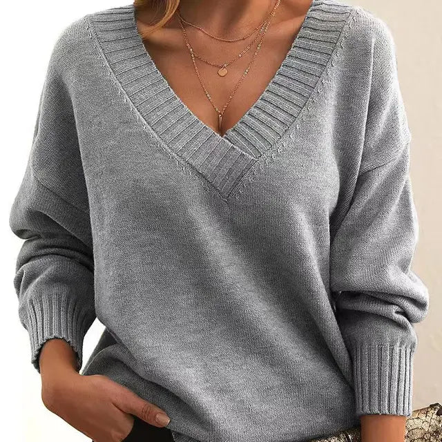 Women's elegant long sleeve pullover, soft knit, versatile round neck sweater for fall & winter fashion.