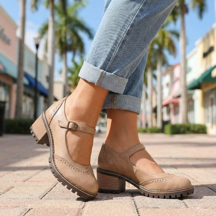 Comfortable women's T-strap closed-toe block heels, offering stability and style for dress or work.